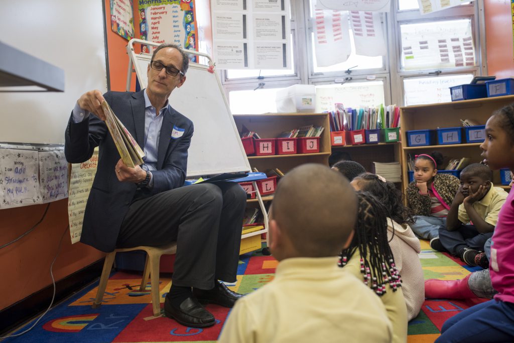 First Book and TATA Consultancy Services volunteer at the Urban Scholars Community School in Bronx, NY on March 28th, 2016. (Photo by Julie Hau)