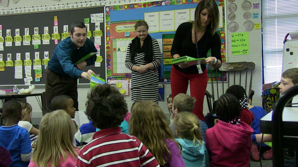 tata-tech-first-book-kyle-heythaler-and-erin-holley-pass-out-books